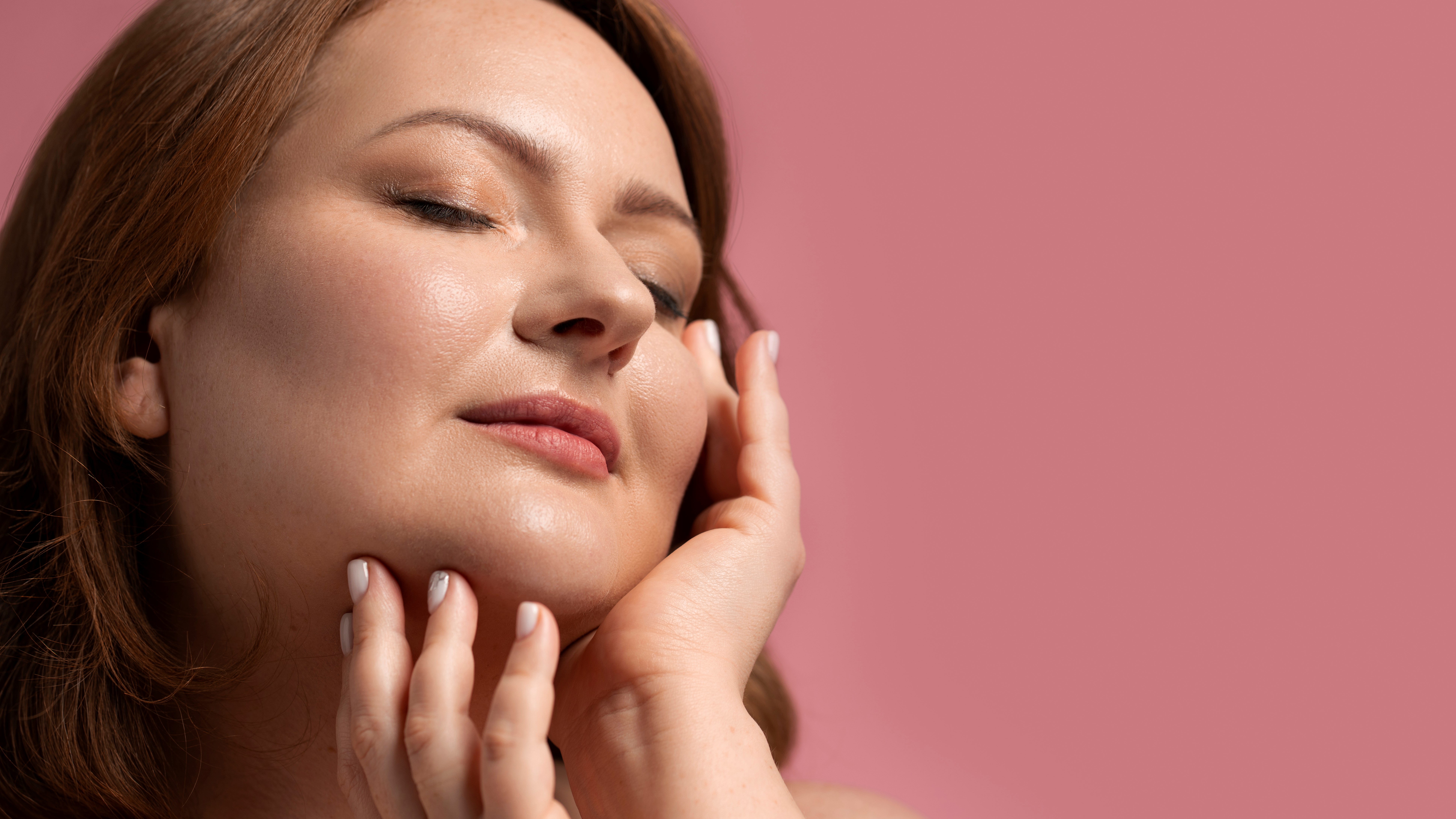 A model posing, showing a skin tightening effect.